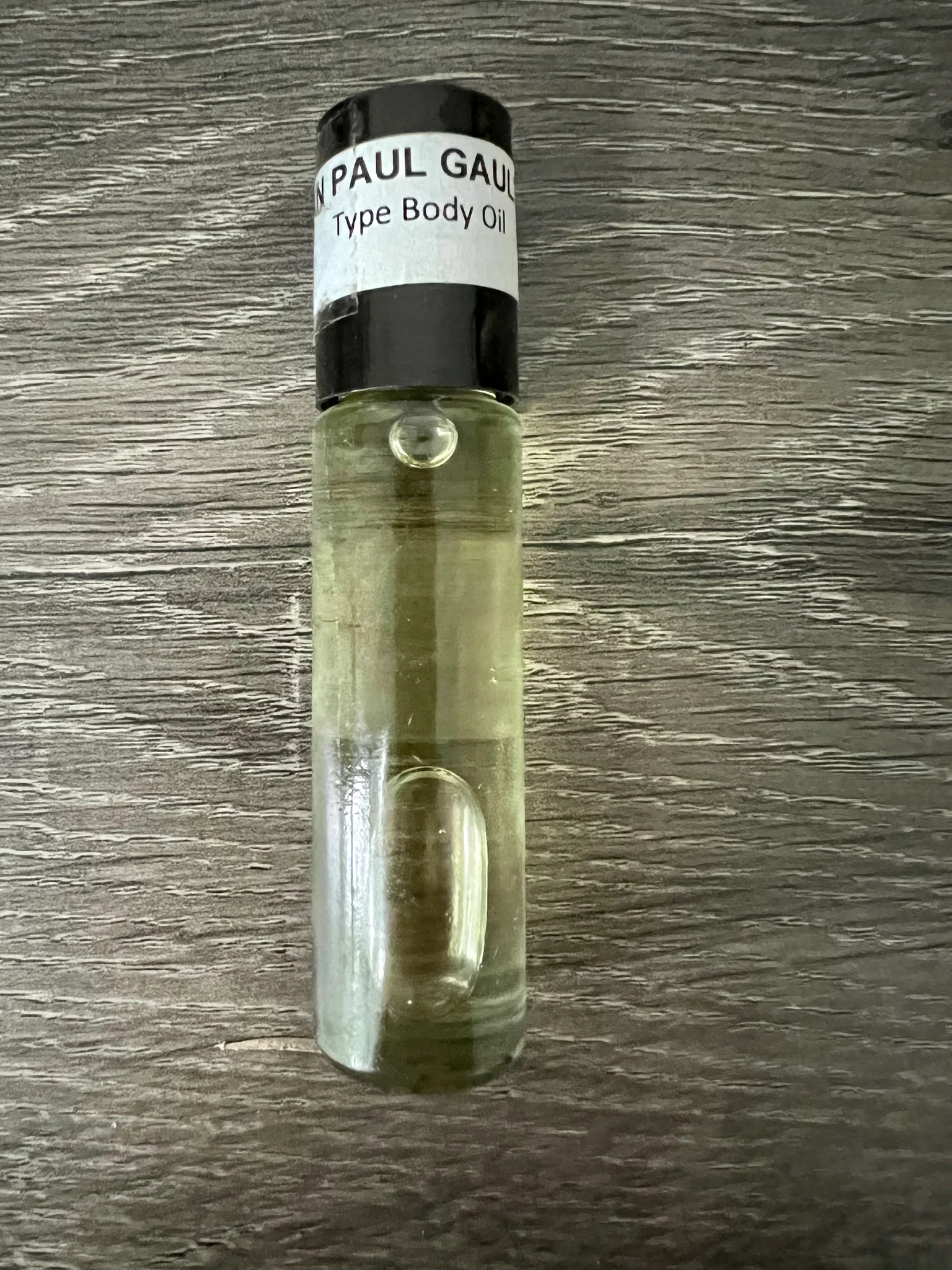 Jean Paul Gaultier Body Oil Once Jean Paul Gaultier Classique EDT has reached its full dry down, it can be summarized as a strong projection, musky, yellow floral ylang-ylang, white floral tuberose, orange blossom, orchid, iris, sweet vanilla, fruity plum, spicy star anise, cinnamon, and sandalwood fragrance.